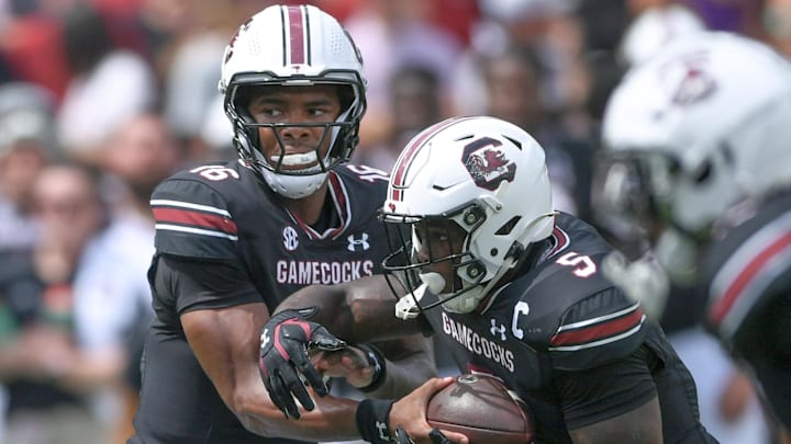 South Carolina quarterback LaNorris Sellers (16) hands off the ball to Rocket Sanders (5) during the first quarter at Williams-Brice Stadium in Columbia, S.C. Saturday, September 14, 2024.