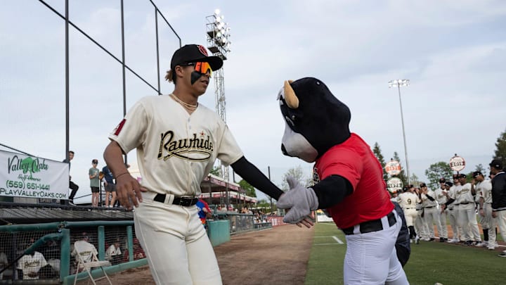 Visalia Rawhide's Druw Jones leaves the dugout before their home opener Tuesday, April 11, 2023 against the Rancho Cucamonga Quakes.

0411 Bb Rc Rawhide 6785t