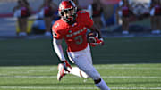 UNLV Rebels running back Lexington Thomas (3) runs with the ball during a game against the Hawaii Rainbow Warriors at Sam Boyd Stadium. Mandatory Credit: Stephen R. Sylvanie-Imagn Images