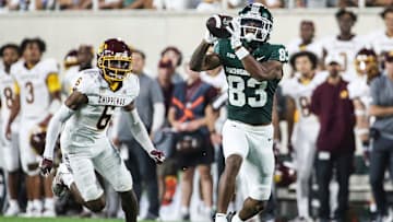 Michigan State wide receiver Montorie Foster Jr. (83) makes a catch against Central Michigan defensive back Lavario Wiley (6) during the first half at Spartan Stadium in East Lansing on Friday, Sept. 1, 2023.