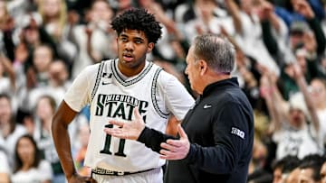 Michigan State's head coach Tom Izzo, right, talks with Jase Richardson during the first half in the game against Wisconsin on Sunday, March 2, 2025, at the Breslin Center in East Lansing.