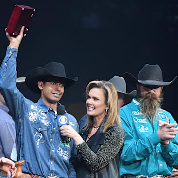 Dec 10, 2016; Las Vegas, NV, USA;  Overall winner Junior Nogueira salutes the crowd after receiving his World Champion buckle during an awards ceremony on the final night of the National Finals Rodeo at Thomas & Mack Center. 