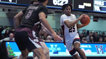 Stepinac's Jasiah Jervis (25) drives to the paint during the William F. Plunkett Jr. Christmas Classic against Scarsdale at Westchester County Center in White Plains on Saturday, December 21, 2024.