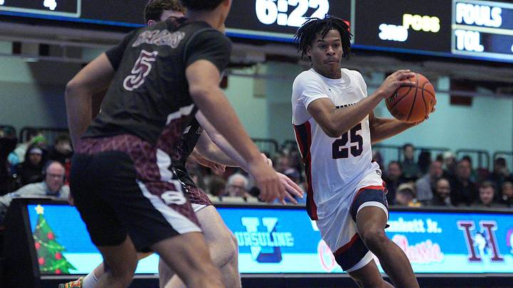 Stepinac's Jasiah Jervis (25) drives to the paint during the William F. Plunkett Jr. Christmas Classic against Scarsdale at Westchester County Center in White Plains on Saturday, December 21, 2024.