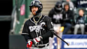 Lugnuts' Tommy White prepares to bat against Michigan State in the first inning on Tuesday, April 1, 2025, during the Crosstown Showdown at Jackson Field in Lansing.