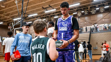 Michigan State's Frankie Fidler signs autographs for fans on Thursday, June 27, 2024, during the Moneyball Pro-Am at Holt High School.