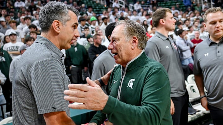 Michigan State's coach Tom Izzo, right, talks with Colgate's head coach Matt Langel before the game on Monday, Nov. 3, 2025, at the Breslin Center in East Lansing. Michigan State's coach Tom Izzo, right, talks with Colgate's head coach Matt Langel before the game on Monday, Nov. 3, 2025, at the Breslin Center in East Lansing.