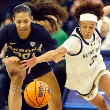 Notre Dame junior Hannah Hidalgo (3) goes to steal the ball from Akron's Keiryn McGuff during an NCAA women's college basketball game between Notre Dame and Akron Wednesday, Nov. 12, 2025, at Purcell Pavilion in South Bend, Indiana.