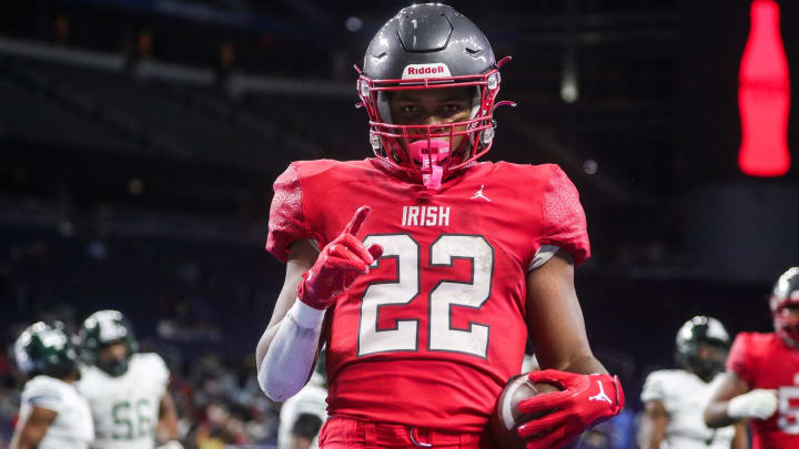 Detroit Toledo Central Catholic running back Marquan Braswell scores a touchdown against Cass Tech during the first half of CHSL Prep Bowl at Ford Field in Detroit on Saturday, Oct. 21, 2023.