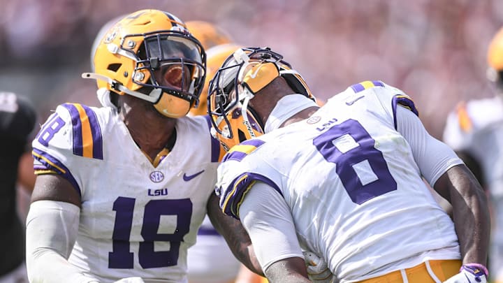 Louisiana State University safety Major Burns (8) and linebacker Greg Penn III (18) react after sacking South Carolina quarterback Robby Ashford (1) during the fourth quarter at Williams-Brice Stadium in Columbia, S.C. Saturday, September 14, 2024.