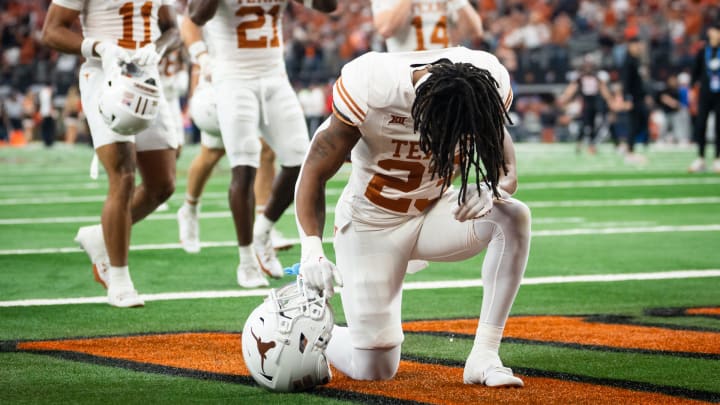 Texas running back Jaydon Blue (23) prays in the end zone ahead of the Big 12 Conference