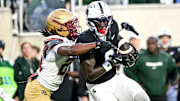 Michigan State's Nick Marsh, right, catches a touchdown pass as Boston College's Amari Jackson attempts to make the tackle during the first quarter on Saturday, Sept. 6, 2025, at Spartan Stadium in East Lansing.