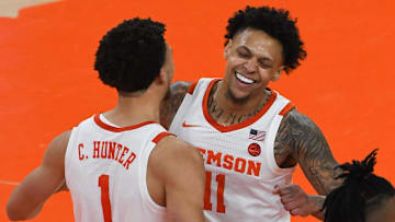 Clemson junior guard Chase Hunter (1) congratulates Clemson guard Brevin Galloway (11) after he made a shot late in the second overtime at Littlejohn Coliseum Tuesday, November 29, 2022.

Clemson Basketball Vs Penn State University Acc Big 10 Challenge