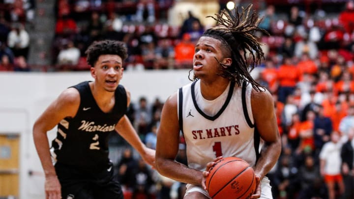 Orchard Lake St. Mary's guard Trey McKenney goes to the basket against Birmingham Brother Rice during the second half of MHSAA Division 1 quarterfinal at Calihan Hall in Detroit on Tuesday, March 12, 2024.