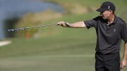 Dec 9, 2023; Bradenton, Florida, USA; Team International s Steven Alker points out a spot for a putt in the 18th hole during the pro-am event at The Concession Golf Club. Mandatory Credit: Jeff Swinger-USA TODAY Sports