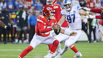 Detroit Lions defensive end Aidan Hutchinson (97) looks to tackle Kansas City Chiefs quarterback Patrick Mahomes (15) during the second half at Arrowhead Stadium in Kansas City, Mo. on Thursday, Sept. 7, 2023.