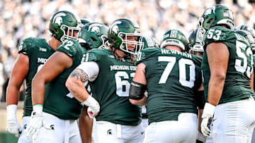 Michigan State's offensive line, from left, Ashton Lepo, Dallas Fincher, Tanner Miller, Luke Newman and Brandon Baldwin huddle up during the fourth quarter in the game against Prairie View A&M on Saturday, Sept. 14, 2024, at Spartan Stadium in East Lansing.
