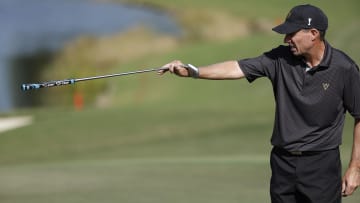 Dec 9, 2023; Bradenton, Florida, USA; Team International s Steven Alker points out a spot for a putt in the 18th hole during the pro-am event at The Concession Golf Club. Mandatory Credit: Jeff Swinger-USA TODAY Sports