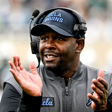 UCLA's interim head coach Tim Skipper celebrates after a Bruins touchdown against Michigan State during the third quarter on Saturday, Oct. 11, 2025, at Spartan Stadium in East Lansing.