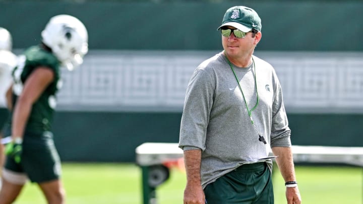 Michigan State's head coach Jonathan Smith watches over the action during the first day of football camp on Tuesday, July 30, 2024, in East Lansing.