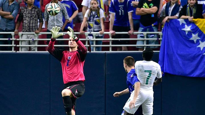 May 30, 2014; St. Louis, MO, USA; Bosnia goalkeeper Asmir Begovic (1) makes a save against Ivory Coast during a soccer friendly at the Edward Jones Dome. Bosnia and Herzegovina defeated Ivory Coast 2-1. Mandatory Credit: Scott Rovak-USA TODAY Sports