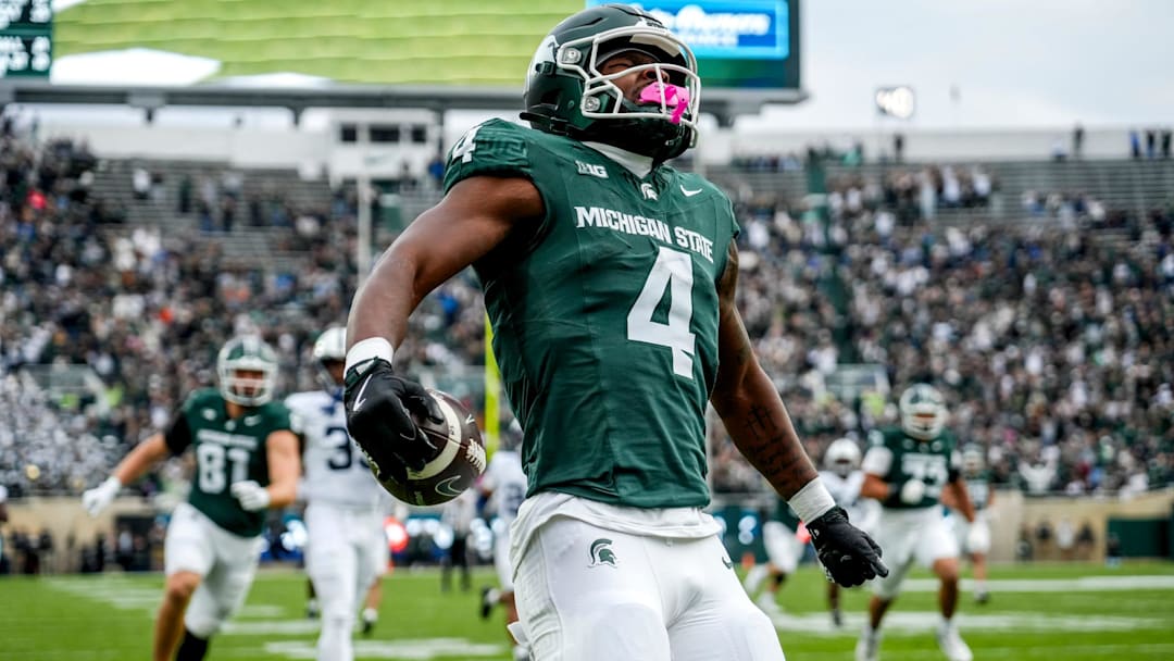 Michigan State's Elijah Tau-Tolliver celebrates his touchdown against Penn State during the first quarter on Saturday, Nov. 15, 2025, at Spartan Stadium in East Lansing.