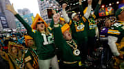 Green Bay Packers fans yell as their pick is made in the second round of 2024 NFL draft in Detroit on Friday, April 26, 2024.
