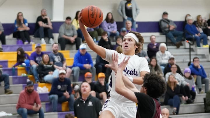 Onsted's Talan Hutchinson goes up for a layup during a game at home against Eaton Rapids.