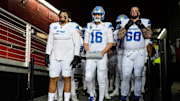 Detroit Lions offensive tackle Penei Sewell, quarterback Jared Goff and offensive tackle Taylor Decker, ready to take the field.