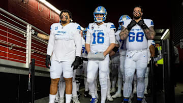 Detroit Lions offensive tackle Penei Sewell, quarterback Jared Goff and offensive tackle Taylor Decker, ready to take the field.