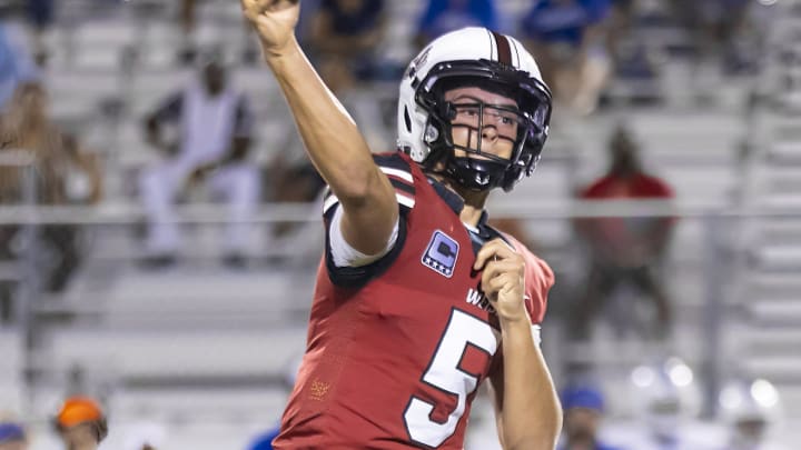 Weiss QB Jax Brown throws a pass during a 6A District 12 win over Temple on Sept. 29, 2023.