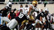 Michigan State's Wayne Matthews III, left, tackles Boston College's Lewis Bond during the second quarter on Saturday, Sept. 6, 2025, at Spartan Stadium in East Lansing.