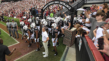 Sep 14, 2024; Columbia, South Carolina, USA; South Carolina head coach Shane Beamer and team get ready to run on the field during the Tommy Suggs 2001 Entrance before a game against the LSU Tigers at Williams-Brice Stadium. Mandatory Credit: Ken Ruinard/USA TODAY Network via Imagn Images