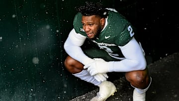Michigan State's Khris Bogle takes a moment senior day recognition before the football game against Rutgers on Saturday, Nov. 30, 2024, at Spartan Stadium in East Lansing.
