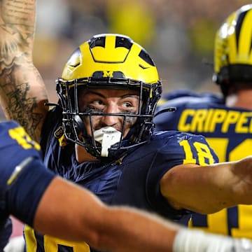 Michigan tight end Colston Loveland (18) celebrates his touchdown against Fresno State during the second half at Michigan Stadium in Ann Arbor on Saturday, Aug. 31, 2024.