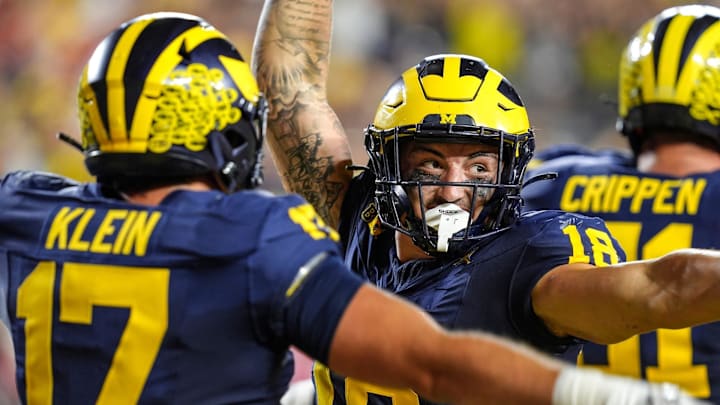 Michigan tight end Colston Loveland (18) celebrates his touchdown against Fresno State during the second half at Michigan Stadium in Ann Arbor on Saturday, Aug. 31, 2024.