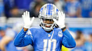 Teddy Bridgewater, seen here waving to fans while on the Lions, is the subject of a Florida impermissible-benefits investigation.