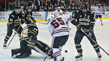 St. Cloud State's Mika Ilvonen tries to get control of the puck in front of the Western Michigan University goal during the Saturday, Jan. 19, game at the Herb Brooks National Hockey Center in St. Cloud. 

Scsu Hock 1