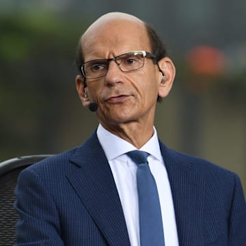 Paul Finebaum, radio and ESPN television personality, gets ready to speak on television near activities outside the Superdome, before of the College Football Playoff National Championship game in New Orleans.