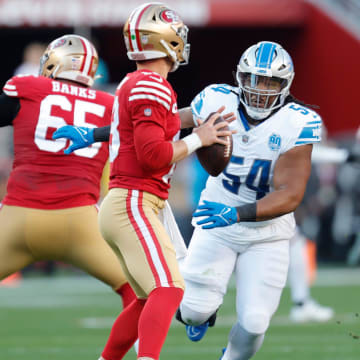 Detroit Lions defensive tackle Alim McNeill runs after 49ers quarterback Brock Purdy