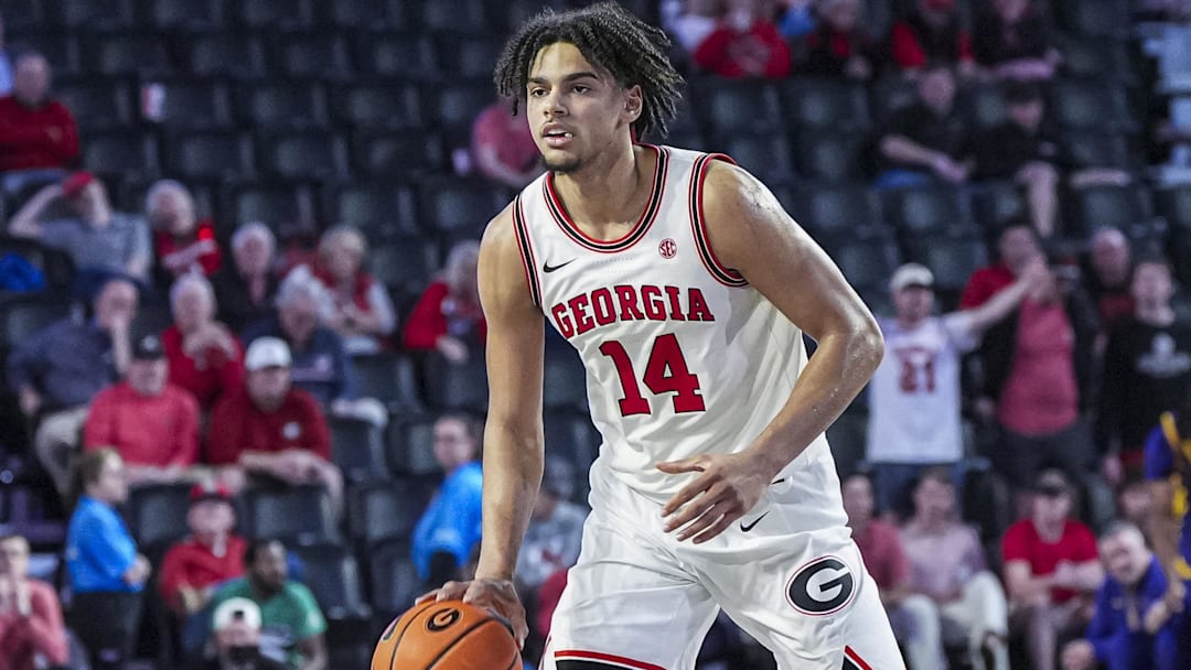 Feb 5, 2025; Athens, Georgia, USA; Georgia Bulldogs forward Asa Newell (14) controls the ball against the LSU Tigers during the second half at Stegeman Coliseum. Mandatory Credit: Dale Zanine-Imagn Images