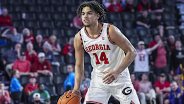 Feb 5, 2025; Athens, Georgia, USA; Georgia Bulldogs forward Asa Newell (14) controls the ball against the LSU Tigers during the second half at Stegeman Coliseum. Mandatory Credit: Dale Zanine-Imagn Images