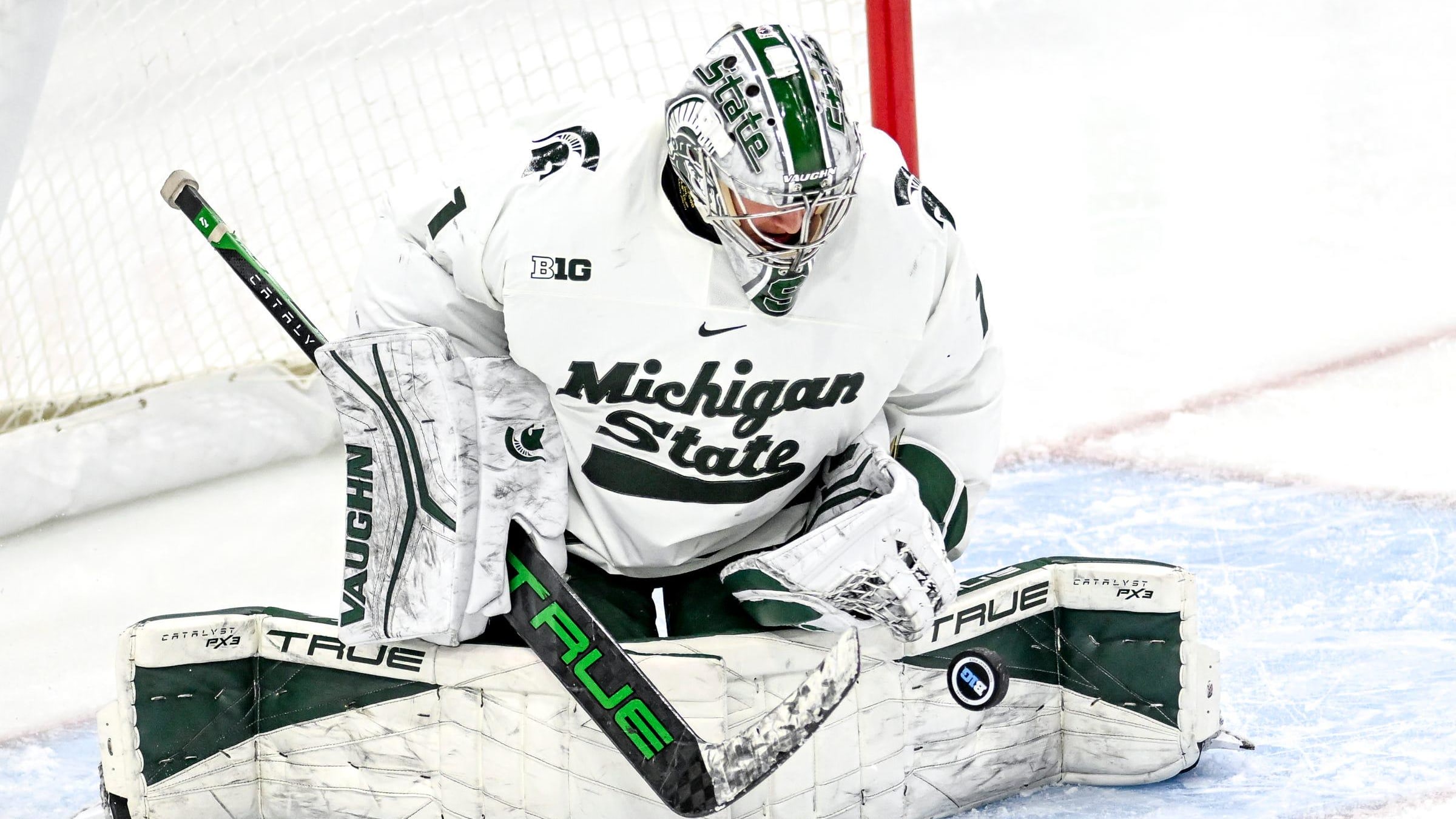 Michigan State's goalie Trey Augustine makes a stop in the first period of the Big Ten tournament