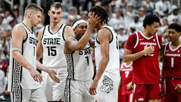 Michigan State's Jeremy Fears Jr., left, talks with Jordan Scott, right, after Scott was fouled by Arkansas during the second half on Saturday, Nov. 8, 2025, at the Breslin Center in East Lansing.