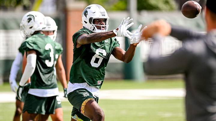 Michigan State's Nick Marsh catches a pass during the first day of football camp on Tuesday, July 30, 2024, in East Lansing.