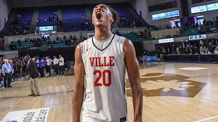 South Carolina basketball commitment Hayden Assemian celebrating his state championship win for Powdersville High School