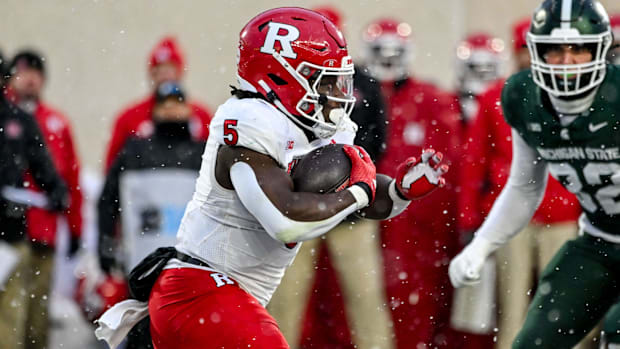 Rutgers' Kyle Monangai runs for a gain against Michigan State