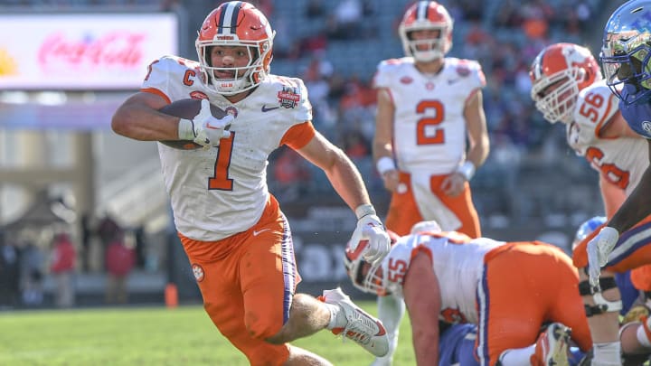 Clemson running back Will Shipley (1) runs during the fourth quarter of the TaxSlayer Gator Bowl at EverBank Stadium in Jacksonville, Florida, Friday, December 29, 2023. Clemson won 38-35.