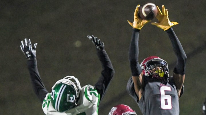 Westside High junior Zeke Marshall (6) intercepts a ball intended for Easley freshman Malachi Ramey (26) during the fourth quarter in Anderson, S.C. Thursday, October 19, 2023.