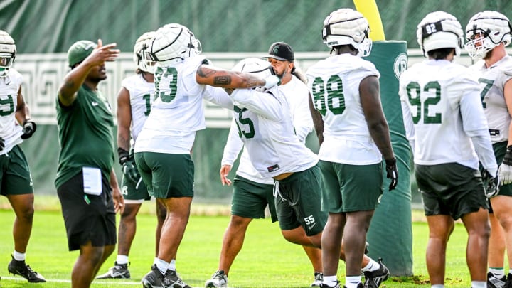 Michigan State's defensive line works out during the first day of football camp on Tuesday, July 30, 2024, in East Lansing.